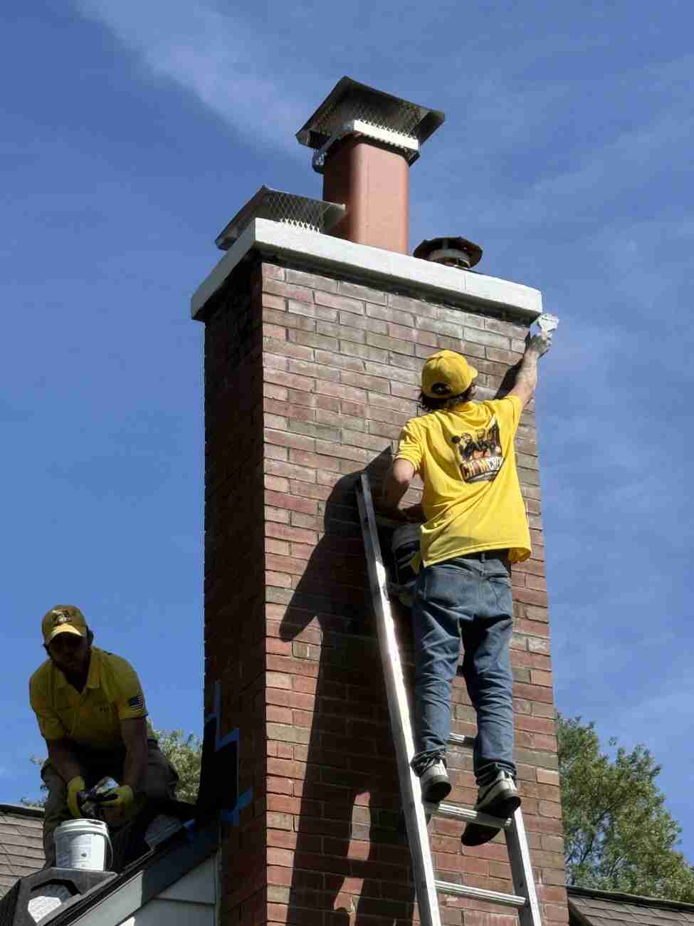 ChimCrew technicians working on an Ohio chimney